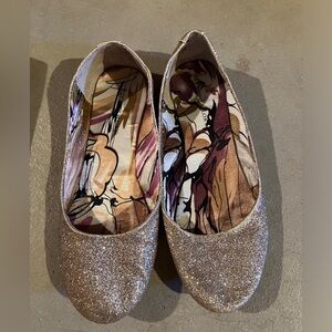 Gold sparkly flats